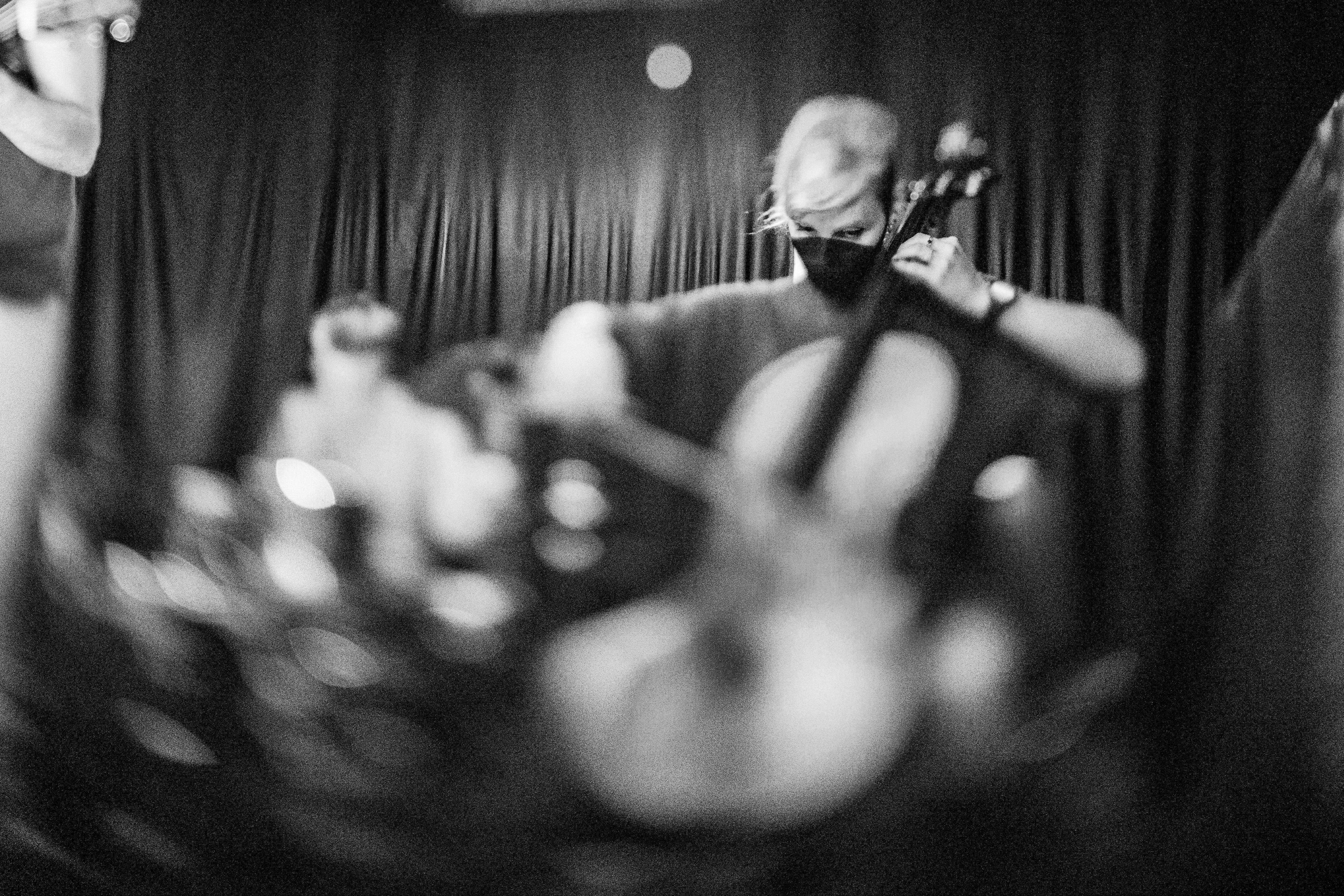 Hailey on cello, black and white. Tilt shift lens dreamily blurring out lower portion of image